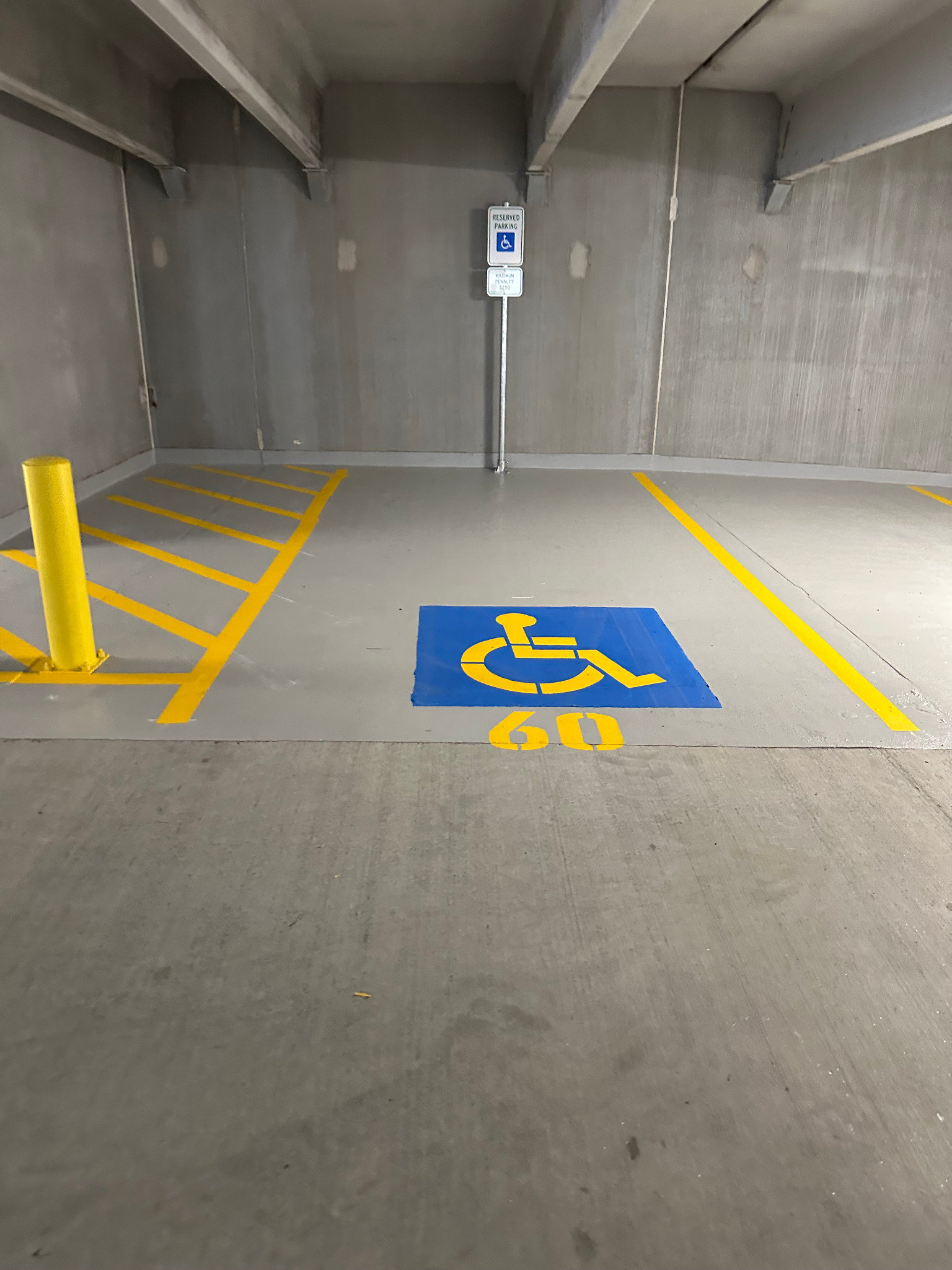 Reserved ADA parking space and bollard markings